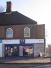 Photo 6x4 Age Concern Shop on site of former Midland Bank Northfield. Sor c2008