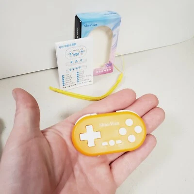 Micro Bluetooth Gamepad Mini Controlador de Bolsillo para PC, Android, Retro Foto 1 de 4