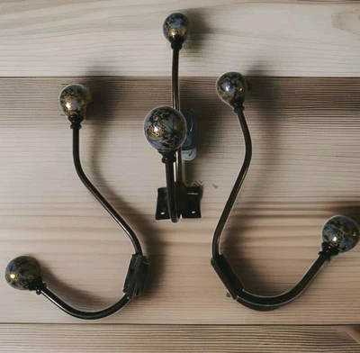 3 ganchos para abrigo/sombrero World Market hechos en India  Foto 1 de 4