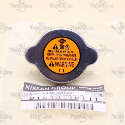 Tapa de tanque de desbordamiento de radiador original Nissan XTERRA FRONTIER PATHFINDER 21430-1P111 Foto 1 de 4