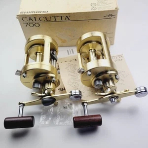 2 carretes Shimano Calcutta 700 oro CT700 hechos en Japón Levelwind 1 caja - Imagen 1 de 16