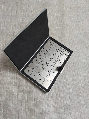 NEXT. Rare Metal Dominoes Game Set Double Six 28 Pieces in Metal Case.  - Image 1 of 4