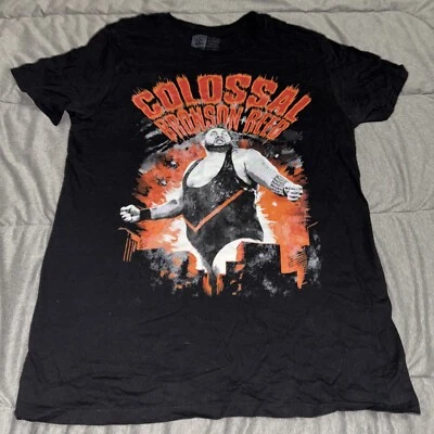 Camisa Colossal Bronson Reed WWE Para Hombre Mediana Negra Naranja Foto 1 de 4