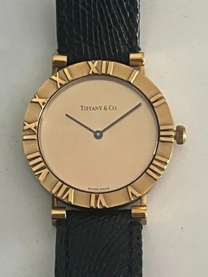 Reloj Tiffany & Co Atlas con correa de oro amarillo de 18 quilates para hombre Foto 1 de 4