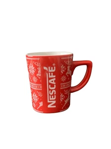 Taza de Navidad roja Nescafé vintage con diseño de cerámica coleccionable char de Navidad - Imagen 1 de 11