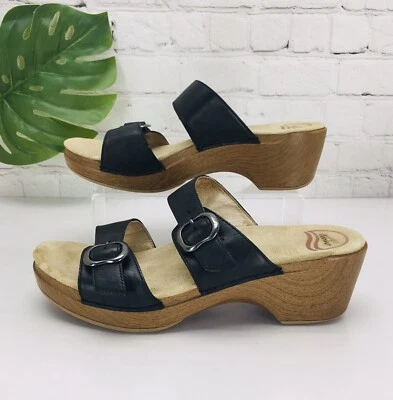 Sandalia para mujer Dansko talla 10/41 Sophie cuero negro tacón de cuña correa hebilla Foto 1 de 4