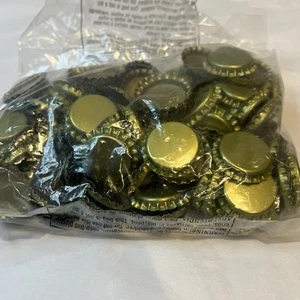 Lote 100 tapas de botellas de cerveza doradas sin usar para elaborar refrescos artesanías tapas en blanco sin prensar - Imagen 1 de 3