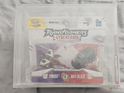 Hasbro Transformers Cybertron Thrust vs. Anti-Blaze / AFA 8.0 - Image 1 of 4