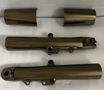 HARLEY 2014-24 BRILLO bronce patas de horquilla Tri deslizamiento rueda libre OEM deslizadores EXTRACTOS Foto 1 de 4