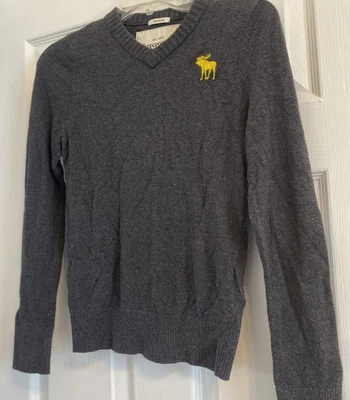 * ABERCROMBIE KIDS * SUÉTER JERSEY GRIS CUELLO EN V ~ USADO EN EXCELENTE ESTADO ~ L Foto 1 de 4
