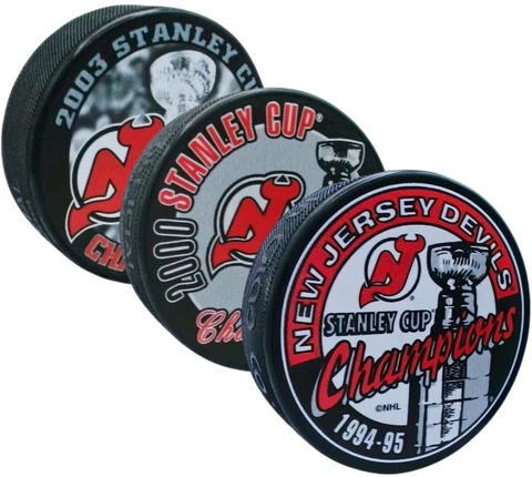 New Jersey Devils Stanley Cup Champions Puck Set - 1995, 2000, 2003 (3-Pack) Cover
