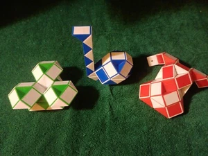 Neu 3 GROßE Magische Schlange Lineal Twist Puzzle 36 Keile. Tolles Weihnachtsgeschenk!! - Bild 1 von 2