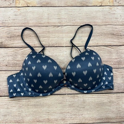 Sujetador push up Victoria's Secret rosa estampado corazón 36B azul marino correas ajustables Foto 1 de 4