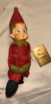 Etiqueta pegatina vintage Inarco Japón arpillera roja abrazador de rodilla elfo la leyenda del duende pixie Foto 1 de 4