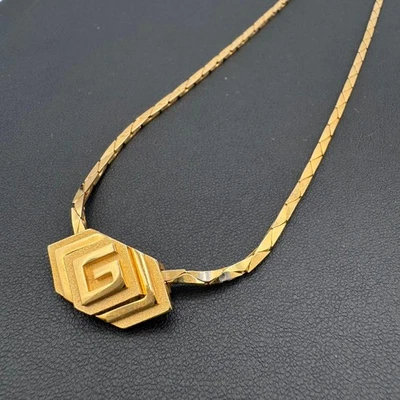 Gargantilla vintage GIVENCHY logotipo G dorado auténtica Foto 1 de 4
