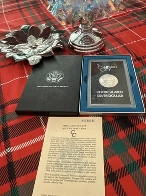 1884 CC US Morgan Dollar $1 GSA Uncirculated W/ COA & OGP Low Certificate # - Image 1 of 4