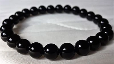 Pulsera de cuentas de ónix negro para hombre elástica 8 mm redonda 7, 7,5, 8 u 8,5 pulgadas Foto 1 de 4