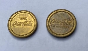 2 verschiedene Coca Cola Münzen Automat b - Bild 1 von 2
