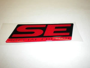 Insignia de emblema genuino de Mitsubishi ""SE"" Evolution NUEVO 2006 - Imagen 1 de 2