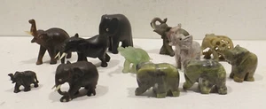 Konvolut 12 verschiedene Elefanten Figuren 6x Stein, 5x Holzetc. 1x Gießware - Bild 1 von 6