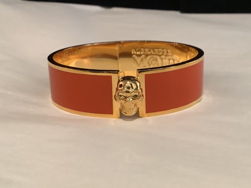 AUTENTICO BRACCIALE INCERNIERATO FIRMATO ALEXANDER MCQUEEN SMALTO ARANCIONE TESCHIO senza prezzo di riserva