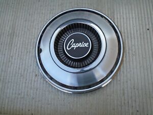 1968,1969 chevrolet caprice nos gm hubcap 3941813 a