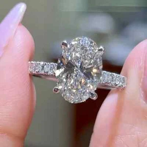 2.70 TCW Oval Cut Moissanite Hidden Halo Engagement Ring 14K White Gold Plated - Picture 1 of 7