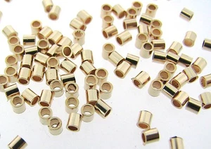 100 EA 14K GOLD GEFÜLLT 2x2mm CRIMP TUBE PERLEN - Bild 1 von 1