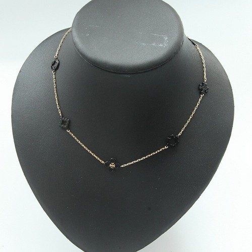 Collana quadrifoglio Tory Burch Kira in oro nero Tory con sacchetto antipolvere