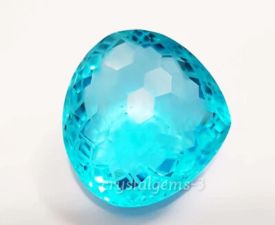 76 Ct Blue Topaz Heart Football Carving Cut Glass Filled Loose Gemstone - Image 1 of 4