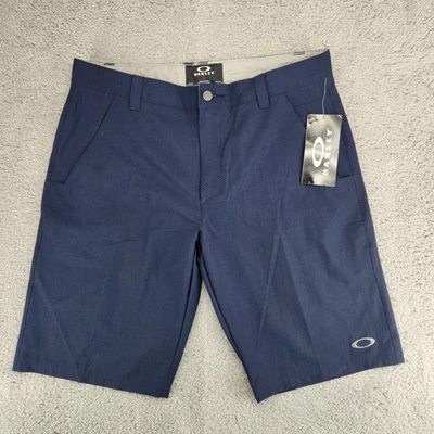 Pantalones cortos de golf Oakley Take Short 2.5 para hombre 38 chinos azules Foto 1 de 4