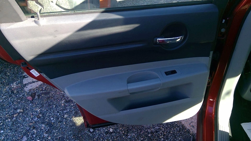Panel de moldura de puerta de conductor trasero Dodge Magnum 05-06 OEM Foto 1 de 1