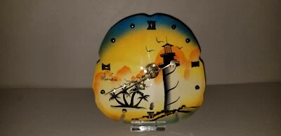 SDC-004 BEAUTIFUL HAND PAINTED SAND DOLLAR CLOCK WITH DISPLAY STAND - Image 1 of 2