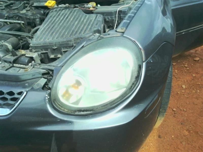 Faro izquierdo del conductor para Dodge Neon 03-05 OEM Foto 1 de 4