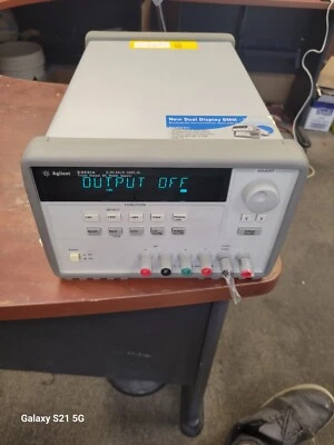 Agilent E3631A Triple Output DC Power Supply E3631A  (2) PLASTIC TER CAPS  SPLIT - Image 1 of 4