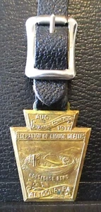 1917 Federazione dei commercianti di liquori 13° convegno orologio da tasca fob curva a ferro di cavallo - Foto 1 di 6