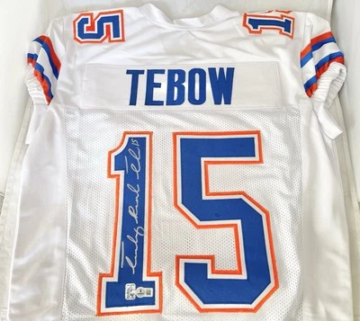 UF FLORIDA GATORS TIM TEBOW signed FULL NAME GAME CUT JERSEY HEISMAN BECKETT - Image 1 of 4