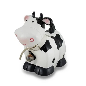 Scratch & Dent Black and White Cow with Bell Coin Bank - Picture 1 of 5