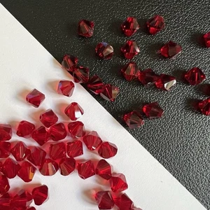 Original Swarovski Kristall Funkelnde Perlen in Siam Januar Juli Doppelkegel Rund - Bild 1 von 9