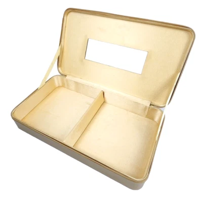 Estuche de joyería/maquillaje dorado vintage Estee Lauder con cremallera y espejo Foto 1 de 4