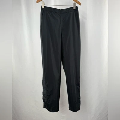 Pantalones de lluvia de golf FootJoy DryJoys Performance para mujer en negro talla mediana Foto 1 de 4
