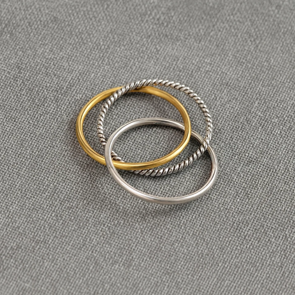 Triple ring set gold band, silver band, and rope twist ring perfect for everyday - Image 1 of 4