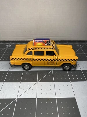 Литая модель такси Schilling желтое такси New York Times Square игрушка Pull Back & Go - Изображение 1 из 4