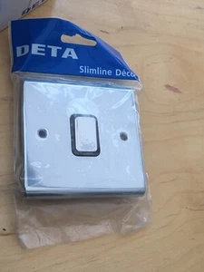 Interruptor de placa intermedio Deta SD1246CH 10A cromado/inserto negro - Imagen 1 de 3