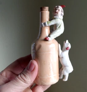 ANTIQUE EARLY 1900 GERMAN PORCELAN LIQUOR BOTTLE DOG CHASING BOY IN NIGHTIES - Picture 1 of 8