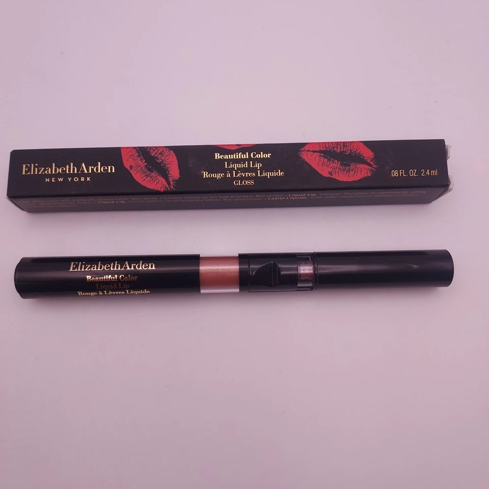 Lápiz labial líquido Elizabeth Arden hermoso color 12G polvo de estrellas raro Foto 1 de 4