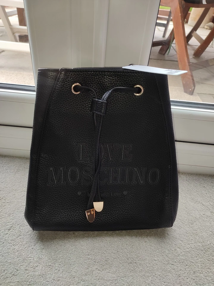 Black Moschino Draw String Rucksack, Gorgeous Gold BNWT - Image 1 of 4