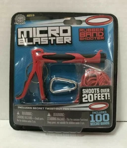 Tirador de banda de goma Hog Wild Micro Blaster con bolígrafo secreto giratorio dispara 20 pies - Imagen 1 de 2