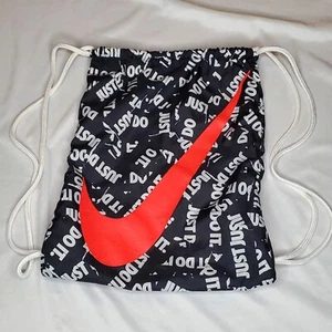 Nike JUST DO IT AOP Cinch Bag Drawstring Backpack Black Orange 13x16 MINOR WEAR - Picture 1 of 15