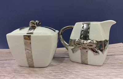 Sugar Bowl + Creamer Beekman Home white w silver bow +Handles - Image 1 of 4